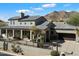 Gorgeous southwestern-style home with well-maintained landscaping and mountain views at 13662 E Shaw Butte Dr, Scottsdale, AZ 85259
