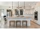 Bright kitchen features a large island, stylish pendant lighting, and stainless steel appliances at 13662 E Shaw Butte Dr, Scottsdale, AZ 85259