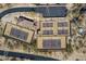 Aerial of community tennis and pickleball courts with surrounding desert landscaping, parking, and small building at 13662 E Shaw Butte Dr, Scottsdale, AZ 85259