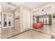 Spacious entryway with tile flooring leading into the well-lit, open-concept living area at 15313 S 180Th Ave, Goodyear, AZ 85338