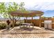 Outdoor eating area with pergola and stainless steel BBQ at 15313 S 180Th Ave, Goodyear, AZ 85338