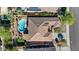 Expansive aerial view of the house featuring a private pool, putting green, and outdoor living space at 15442 W Sells Dr, Goodyear, AZ 85395