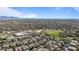 An aerial view showcasing the community, open spaces, and the distant mountains at 15442 W Sells Dr, Goodyear, AZ 85395