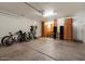 Spacious garage with bike racks and storage space for vehicles and other belongings at 15442 W Sells Dr, Goodyear, AZ 85395