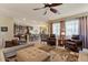 Spacious living room with open floor plan and great natural lighting at 15442 W Sells Dr, Goodyear, AZ 85395