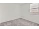 Bedroom features carpet, neutral walls, and a window with blinds at 15564 W Williams St, Goodyear, AZ 85338