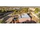 Back of home aerial view features inground pool and patio with desert landscaping at 15865 E Lost Hills Dr, Fountain Hills, AZ 85268