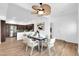 Elegant dining room featuring a stylish table setting and decorative ceiling fan at 15865 E Lost Hills Dr, Fountain Hills, AZ 85268