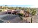 Southwestern-style home with desert landscaping and a cozy front patio, inviting outdoor living at 15865 E Lost Hills Dr, Fountain Hills, AZ 85268