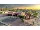 Beautiful home with desert landscaping, a multi-level deck, and stunning sunset views at 15865 E Lost Hills Dr, Fountain Hills, AZ 85268