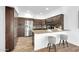 Modern kitchen with stainless steel appliances and a breakfast bar at 15865 E Lost Hills Dr, Fountain Hills, AZ 85268