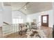 Bright and airy living room with high ceilings, glass block wall, and wood floors at 15865 E Lost Hills Dr, Fountain Hills, AZ 85268