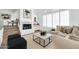 Cozy living room with a fireplace, comfortable seating, and elegant design at 15865 E Lost Hills Dr, Fountain Hills, AZ 85268