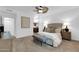 Serene main bedroom featuring neutral tones, plush carpeting, and a cozy sitting area for relaxation at 15865 E Lost Hills Dr, Fountain Hills, AZ 85268