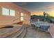 Enjoy outdoor living on the patio of this home with desert landscape and sunset views at 15865 E Lost Hills Dr, Fountain Hills, AZ 85268