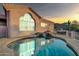 Outdoor pool at twilight, perfect for relaxation and evening swims at 15865 E Lost Hills Dr, Fountain Hills, AZ 85268