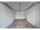 An empty two-car garage with a motor, and concrete floors waiting for your personalization at 19777 N 76Th St # 2150, Scottsdale, AZ 85255