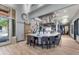 A community kitchen provides an island, seating, commercial refrigerator, and stainless steel vent hood at 19777 N 76Th St # 2150, Scottsdale, AZ 85255