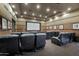Enjoy movies in this theater room with comfortable black leather reclining chairs and projector screen at 19777 N 76Th St # 2150, Scottsdale, AZ 85255