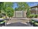 Community water feature with manicured greenery and seating area at 19777 N 76Th St # 2150, Scottsdale, AZ 85255