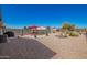 Spacious backyard with patio furniture and desert landscaping at 1994 E Dust Devil Dr, San Tan Valley, AZ 85143