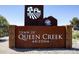 Town of Queen Creek sign made of oxidized metal at 21149 E Canary Way, Queen Creek, AZ 85142