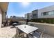 Modern patio area with outdoor seating and barbecue, perfect for entertaining at 25318 N 19Th Dr, Phoenix, AZ 85085