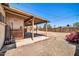 Large backyard featuring a covered patio area, offering potential for outdoor living and landscaping at 2940 W Townley Ave, Phoenix, AZ 85051