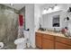 Well-lit bathroom features a tiled shower and modern fixtures at 2940 W Townley Ave, Phoenix, AZ 85051