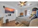 Comfortable bedroom featuring a large TV for relaxation and entertainment at 2940 W Townley Ave, Phoenix, AZ 85051