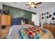 Spacious bedroom features a ceiling fan and ample natural light at 2940 W Townley Ave, Phoenix, AZ 85051