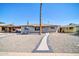 Charming home with desert landscaping and a walkway to the front door at 2940 W Townley Ave, Phoenix, AZ 85051