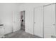 Bright bedroom with closet space, a view of the laundry room, and ample natural light at 3426 E Elgin St, Gilbert, AZ 85295