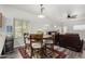 Cozy dining area with a round table, seating for four, and a view into the living room at 3426 E Elgin St, Gilbert, AZ 85295