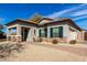 Charming single Gathering home with tile roof, stone accents, and low maintenance desert landscaping at 3426 E Elgin St, Gilbert, AZ 85295