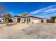 Charming single Gathering home with tile roof, stone accents, and low maintenance desert landscaping at 3426 E Elgin St, Gilbert, AZ 85295