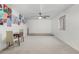 Open flex space with neutral carpet, a ceiling fan, and room for dining or recreation at 3426 E Elgin St, Gilbert, AZ 85295