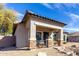 Charming home with a tile roof, stone accents, a welcoming porch, and low maintenance landscaping at 3426 E Elgin St, Gilbert, AZ 85295