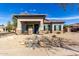 Charming home with a tile roof, stone accents, a welcoming porch, and well-maintained landscaping at 3426 E Elgin St, Gilbert, AZ 85295
