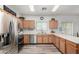 Bright kitchen featuring stainless steel appliances and wood-look flooring at 3426 E Elgin St, Gilbert, AZ 85295