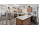 Spacious kitchen featuring stainless steel appliances, wood cabinets, and a functional layout at 3426 E Elgin St, Gilbert, AZ 85295