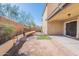 The backyard features a blend of patio space, low-maintenance landscaping, and artificial turf at 35005 N 30Th Dr, Phoenix, AZ 85086