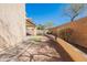 Spacious backyard featuring a mix of rock, hardscape, and artificial turf for easy maintenance at 35005 N 30Th Dr, Phoenix, AZ 85086
