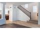 Spacious foyer with tile flooring and staircase to upper level at 35005 N 30Th Dr, Phoenix, AZ 85086