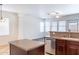 Open-concept kitchen with island, stainless steel appliances, and stylish countertops at 35005 N 30Th Dr, Phoenix, AZ 85086