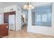Bright kitchen with tile floors, an island, and an open view to other living spaces at 35005 N 30Th Dr, Phoenix, AZ 85086
