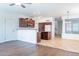 Open living space showcasing a kitchen with wooden cabinets at 35005 N 30Th Dr, Phoenix, AZ 85086
