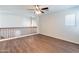 Loft space with hardwood floors, ceiling fan, and windows for natural light at 35005 N 30Th Dr, Phoenix, AZ 85086