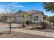 Well-kept home featuring desert landscaping, a tidy yard, and a two-car garage at 4091 S Dew Drop Ct, Gilbert, AZ 85297