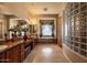 Expansive bathroom featuring double sinks, granite countertops, and a soaking tub under a window at 41607 N Club Pointe Dr, Phoenix, AZ 85086